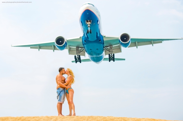 couple with airplane at phuket airport